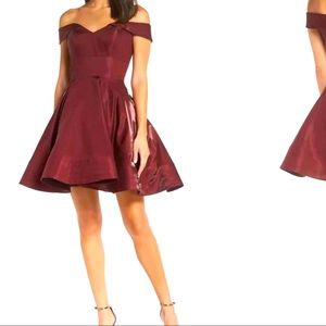 Off the shoulder shimmer party dress by XSCAPE